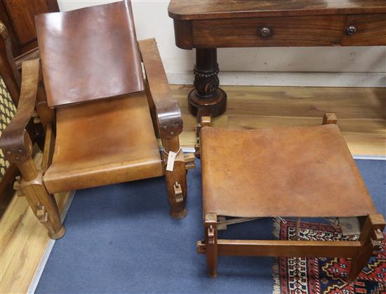 A pair of mid century French teak and upholstered safari chairs (and stool)
